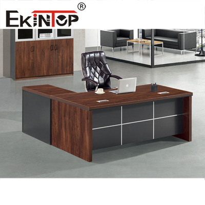El PVC en forma de L del escritorio de oficina grande ejecutivo de madera del MDF bordea el color de la caoba